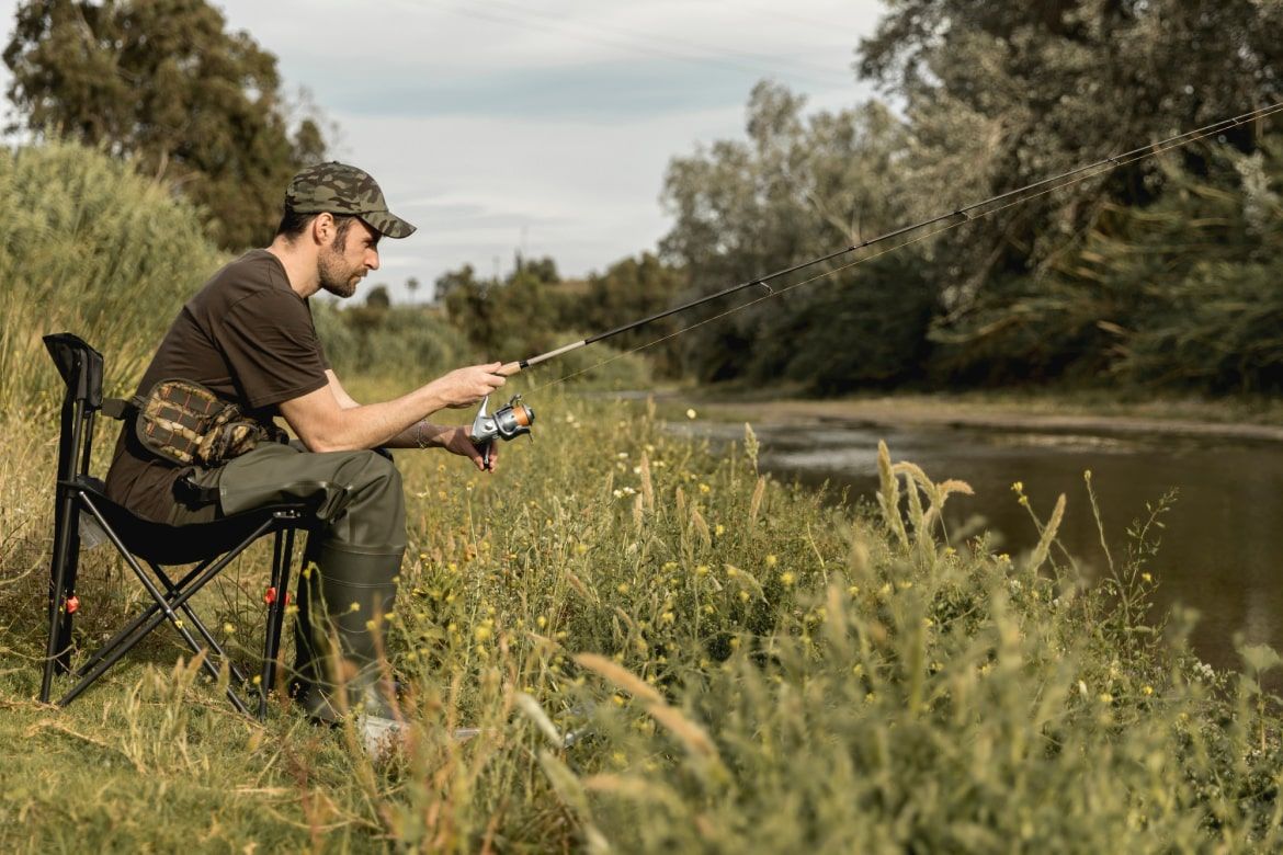 Person fishing in river